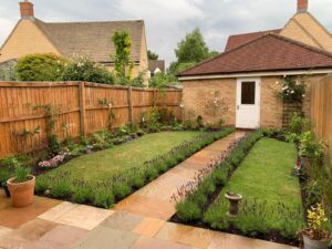 A new build garden in Chipping Norton with new paving, new flowerbeds and planting