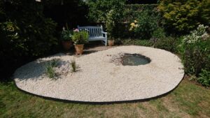A low maintenance gravel garden with small pond made to our clients specification Hook Norton