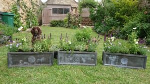Garden maintenance and planting up planters in Bledington